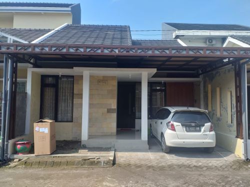 foto tampak rumah tipe 56 perumahan FIRDAUS MANSION