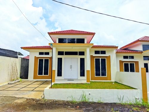 foto tampak rumah tipe Gracia Anggana perumahan Lembah Nyiur Kairagi Mas