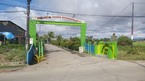 foto gerbang perumahan Pesona Barombong Indah - Gowa
