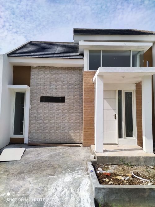 foto tampak rumah tipe Blok F 30/60 perumahan The Queen Residence