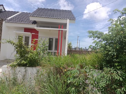foto tampak rumah tipe OPAL B HOOK 1 perumahan GRAND PESONA