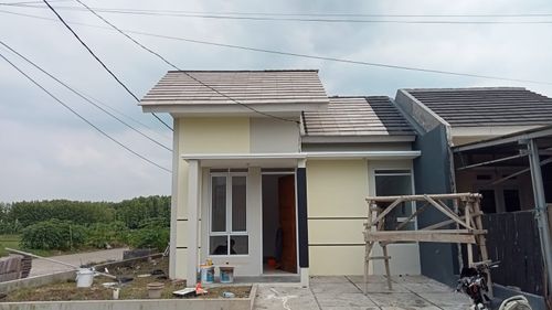 foto tampak rumah tipe 36/82 perumahan PESONA KAHURIPAN