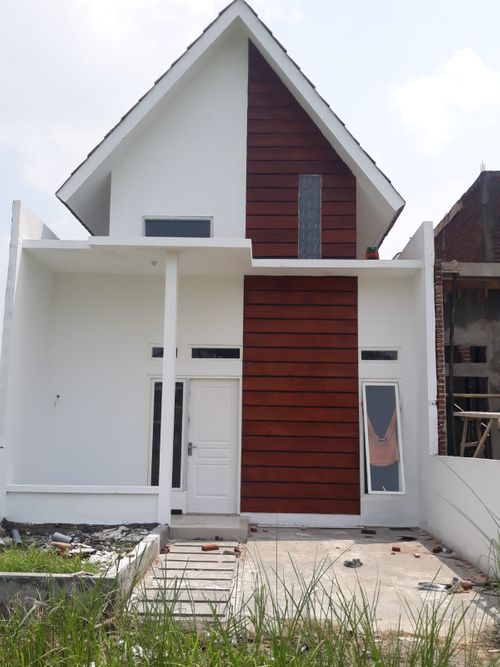foto tampak rumah tipe Minimalis Mezzanine perumahan Green Puspa Asri