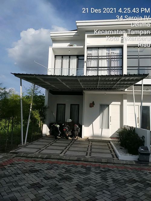 foto tampak rumah tipe ALISIA perumahan CEMARA SUITES