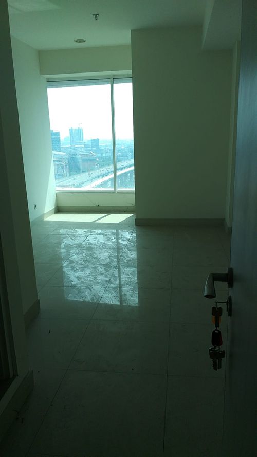 foto tampak rumah tipe EMERALD STUDIO B perumahan GRAND KAMALA LAGOON TOWER EMERALD & BARCLAY