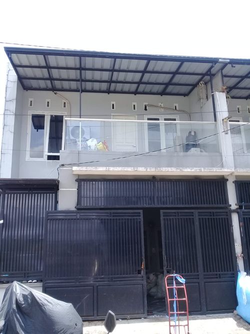 foto tampak rumah tipe 167/90 perumahan PERMATA CIKURUBUK REGENCY