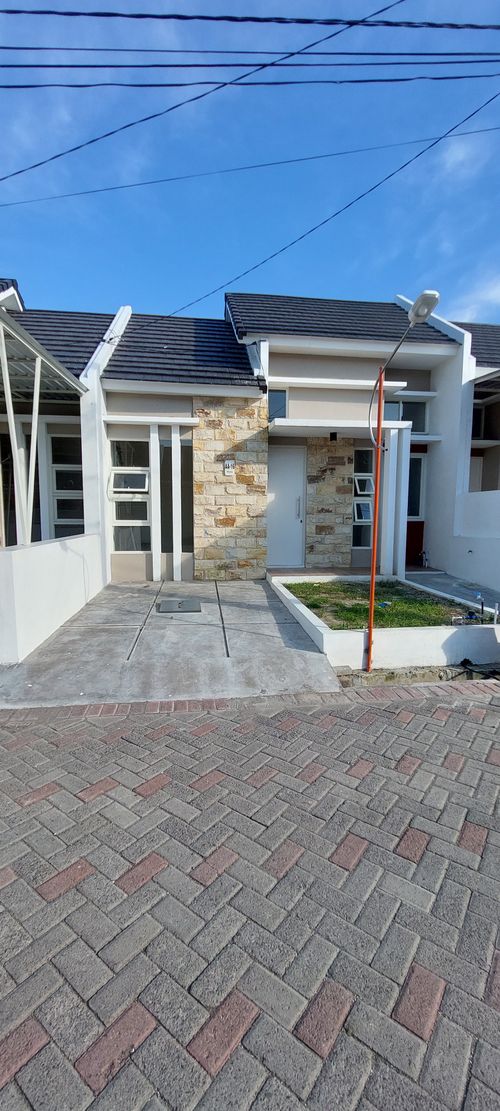foto tampak rumah tipe PERMATA T.46 AA-16 perumahan PERMATA REGENCY