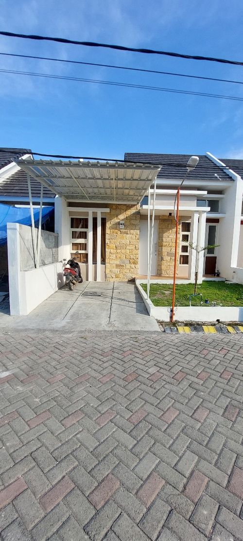 foto tampak rumah tipe PERMATA T.46/78 AA perumahan PERMATA REGENCY