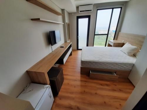 foto tampak rumah tipe STUDIO CV perumahan MONROE TOWER