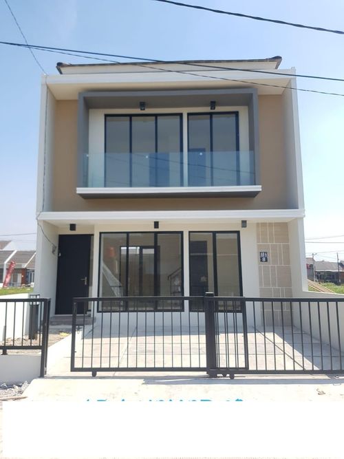 foto tampak rumah tipe Dharmawangsa -82 perumahan GRAND RESIDENCE CITY