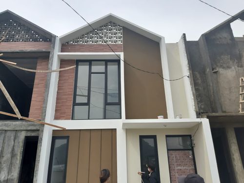 foto tampak rumah tipe 33 Mezzanine (351) perumahan Griya Pataruman Asri 3