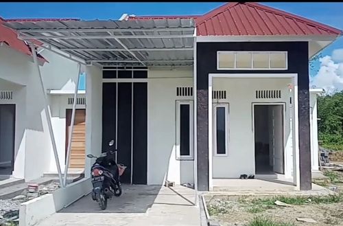 foto tampak rumah tipe MAWAR perumahan VILLA MUTIARA MASOHI
