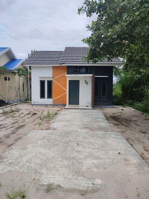 foto tampak rumah tipe 36 Plus perumahan BAMBU MAS INDAH