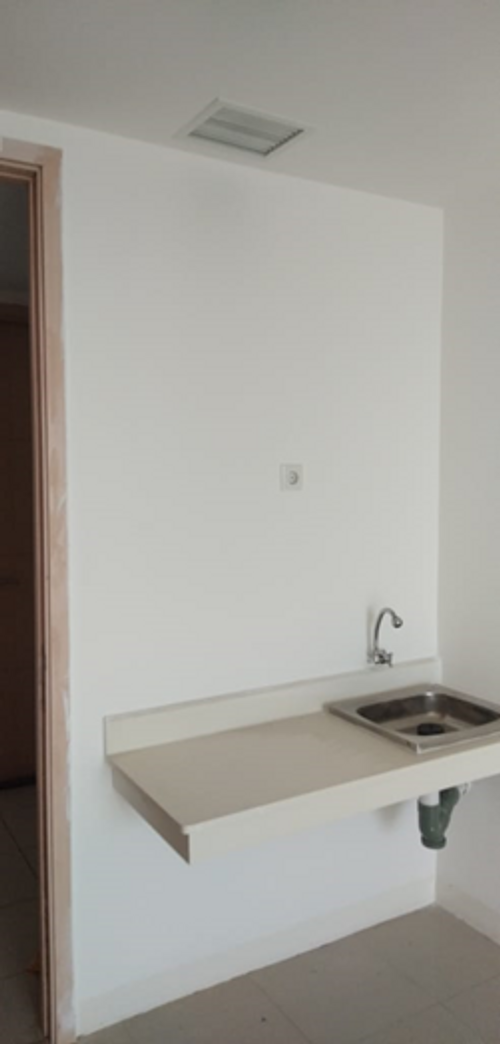 foto tampak rumah tipe STE perumahan APARTEMEN BASSURA CITY
