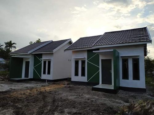 foto tampak rumah tipe 36 perumahan Bambu Mas Residence