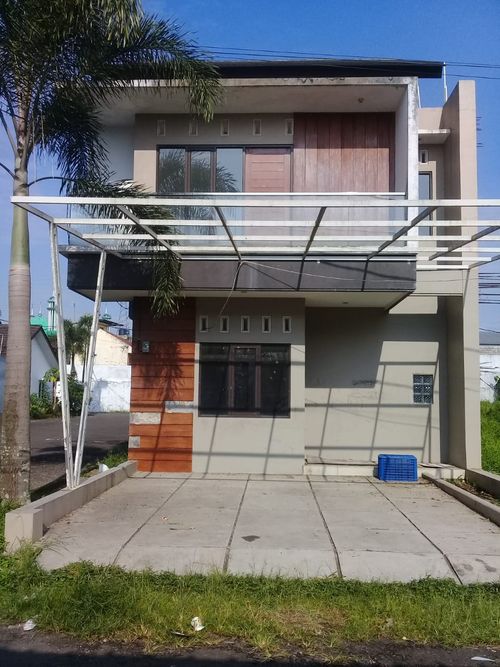 foto tampak rumah tipe 65 perumahan PERMATA CIKURUBUK REGENCY