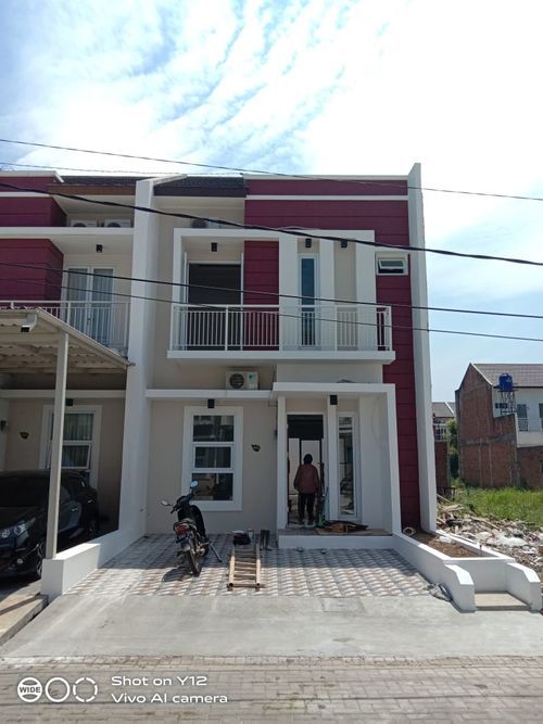 foto tampak rumah tipe 88-L102A perumahan TAMAN KOPO KATAPANG