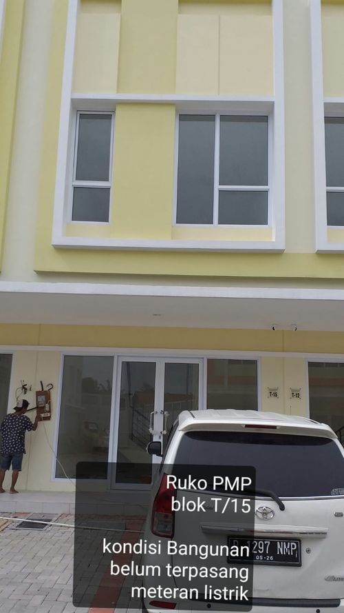 foto tampak rumah tipe T/15 perumahan RUKO PASAR MODERN PARAMOUNT TAHAP 3