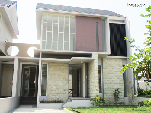 foto tampak rumah tipe MILTONIA perumahan DE CASSABLANCA RESIDENCE