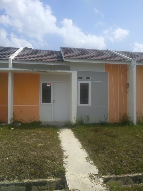 foto tampak rumah tipe Anggrek Vanila perumahan CitraRaya City Cluster Bukit Cempaka
