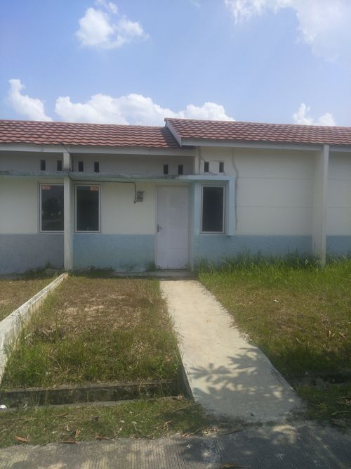 foto tampak rumah tipe Anggrek Cattleya perumahan CitraRaya City Cluster Bukit Cempaka