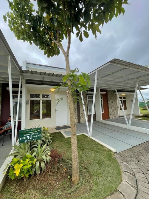 foto tampak rumah tipe 30 Standar perumahan MUTIARA GADING 2 EXTENSION