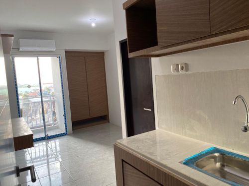 foto tampak rumah tipe DELUXE perumahan Suncity Residence Apartemen