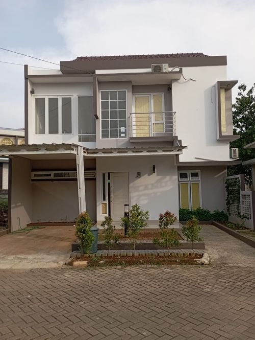 foto tampak rumah tipe 119 perumahan Grand Sokka Residence