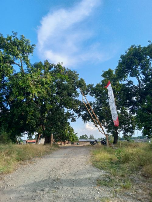 foto gerbang perumahan GRAHA PESONA 2