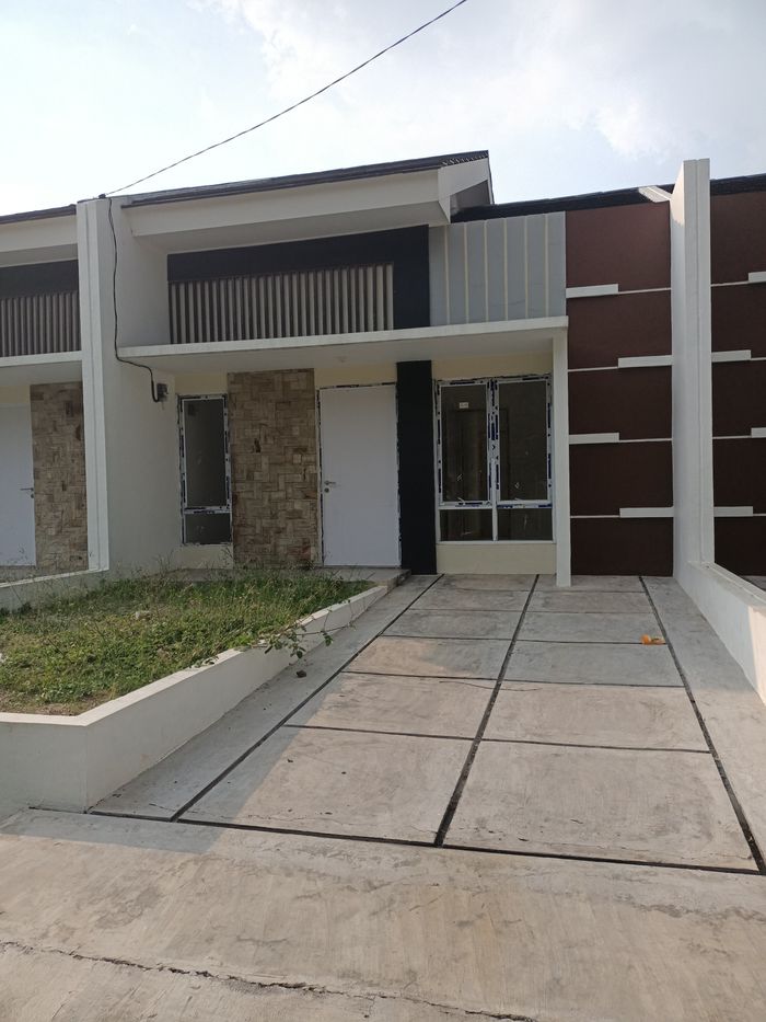 foto tampak rumah tipe JESPER B perumahan GRAND PESONA