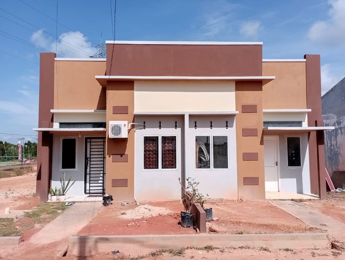 foto tampak rumah tipe RST 36/84 Blok E perumahan Perumnas Baru Bumi Tanjung Permai 2