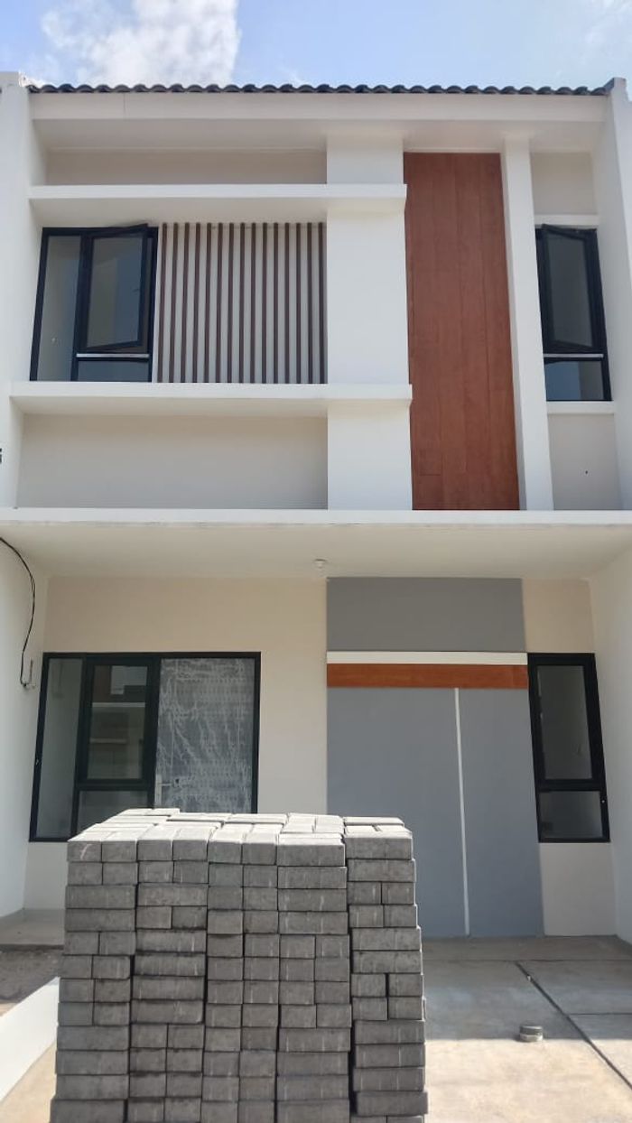 foto tampak rumah tipe 44 Cozy Level (325) perumahan G-Land Harmony Hills