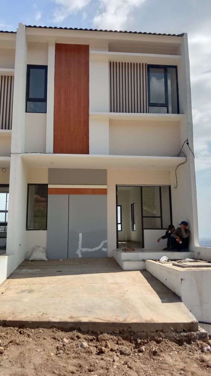 foto tampak rumah tipe 44 Cozy Level (366) perumahan G-Land Harmony Hills