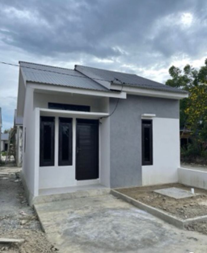 foto tampak rumah tipe 36/98 perumahan TRIPUTRA REGENCY