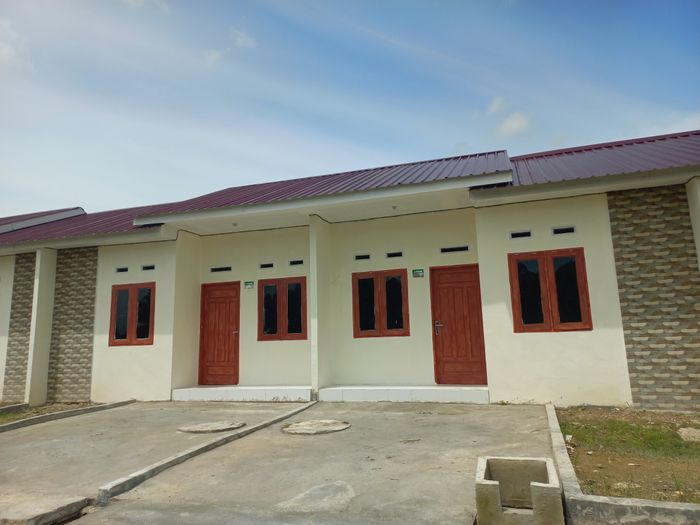 foto tampak rumah tipe 36/84 perumahan PESONA KARYA MENCIRIM