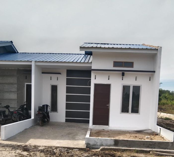 foto tampak rumah tipe 36 perumahan JAHARUN INDAH RESIDENCE