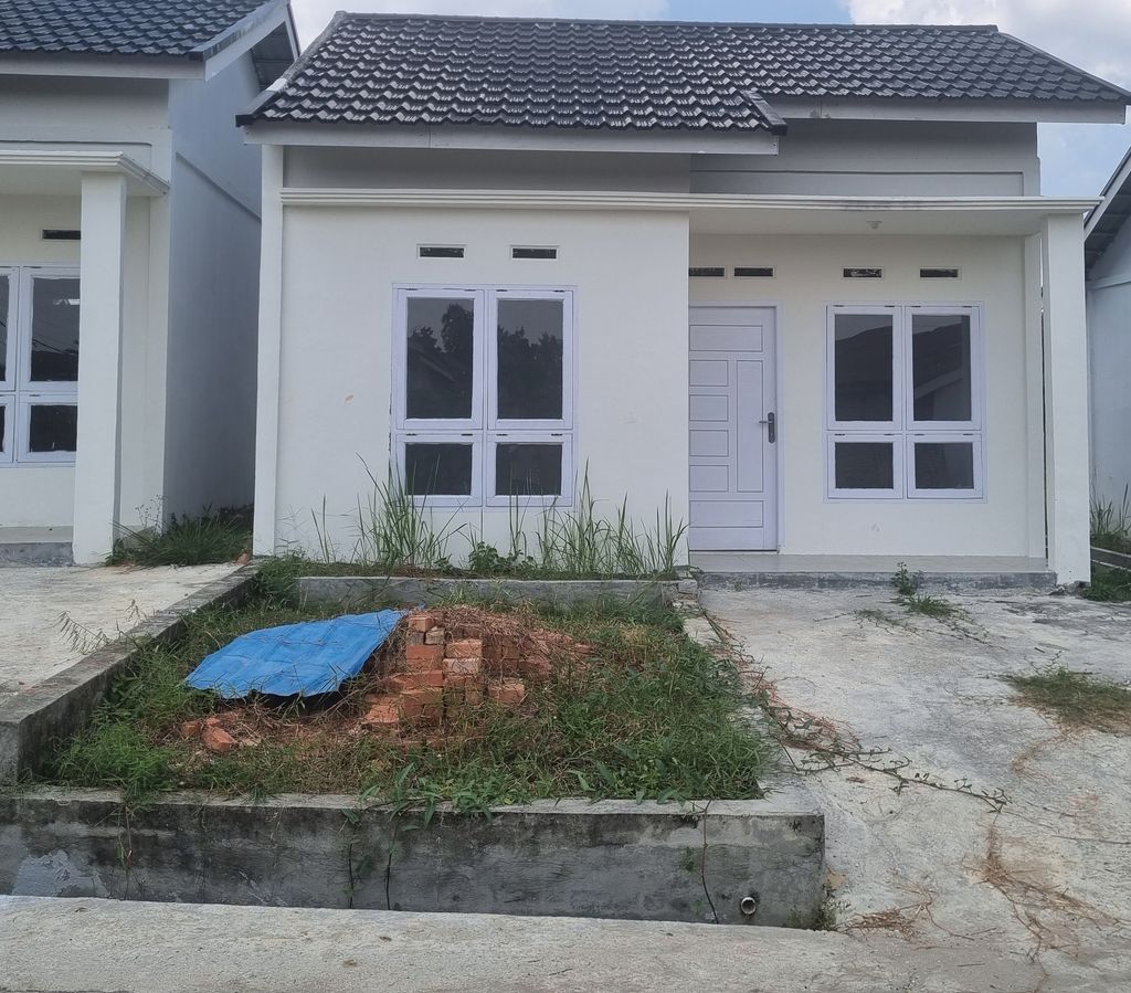 foto tampak rumah tipe RSH 36 perumahan ASTA HARMONY