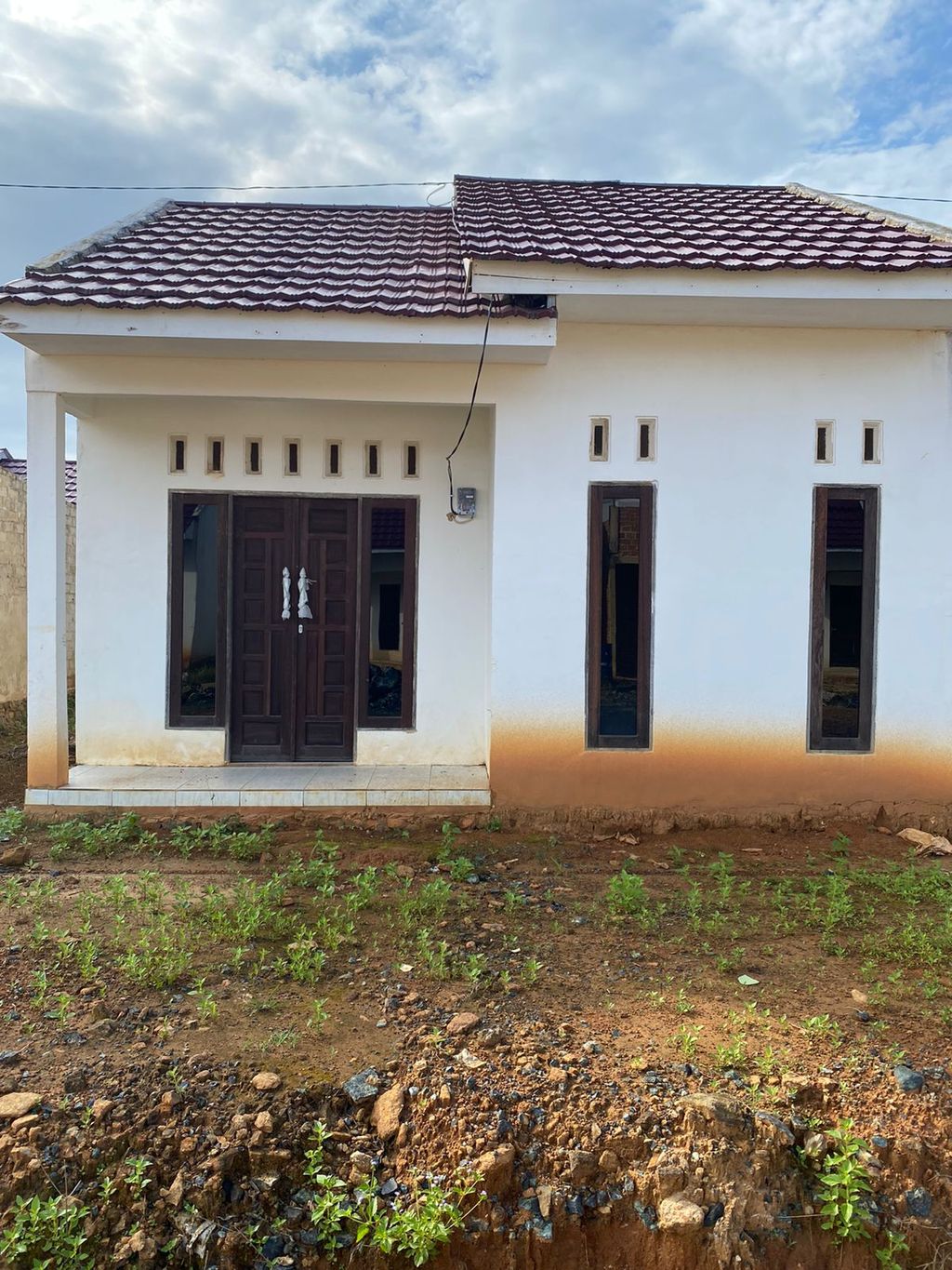 foto tampak rumah tipe 36 perumahan GRAHA CITRA KHASANAH