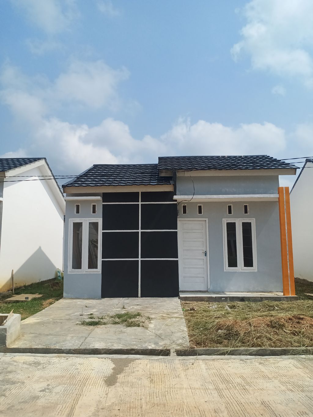 foto tampak rumah tipe 36 perumahan GRAND CITRA MANDIRI 2 TAHAP 5
