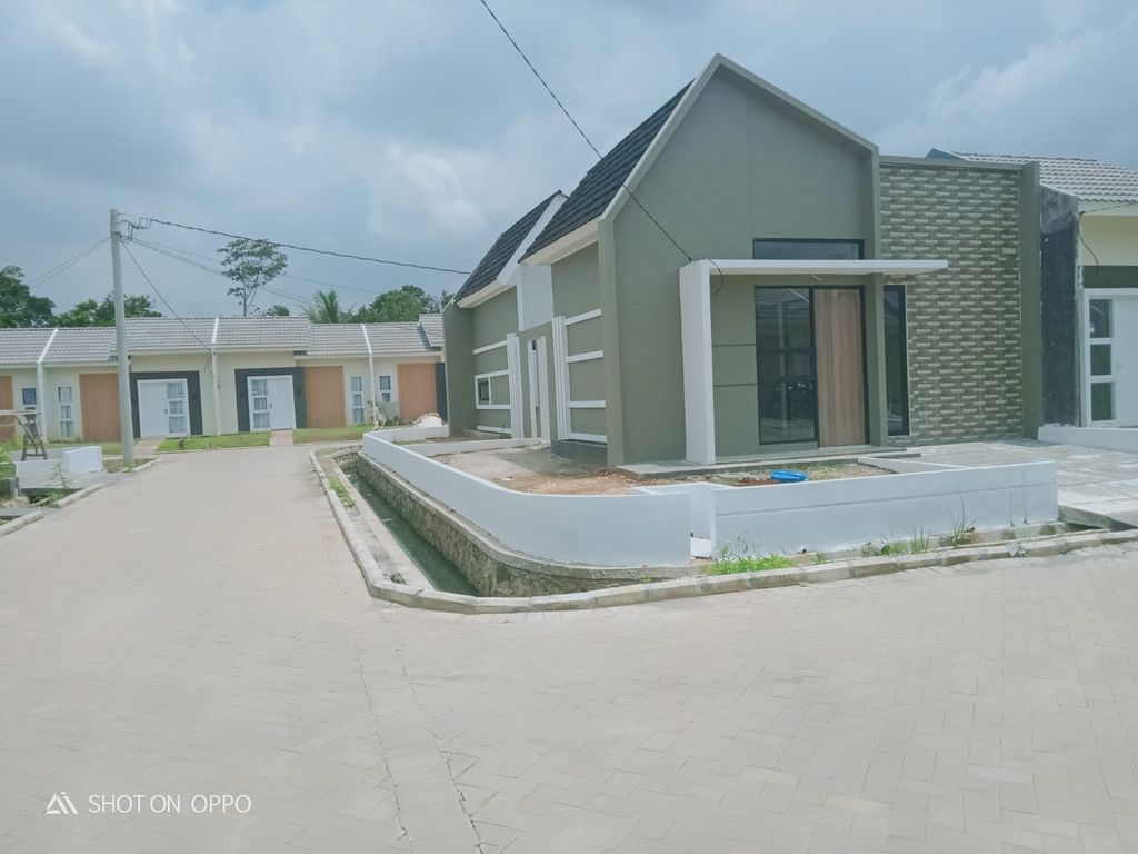 foto tampak rumah tipe LOTUS SUDUT perumahan Synergy Residence Jatisari