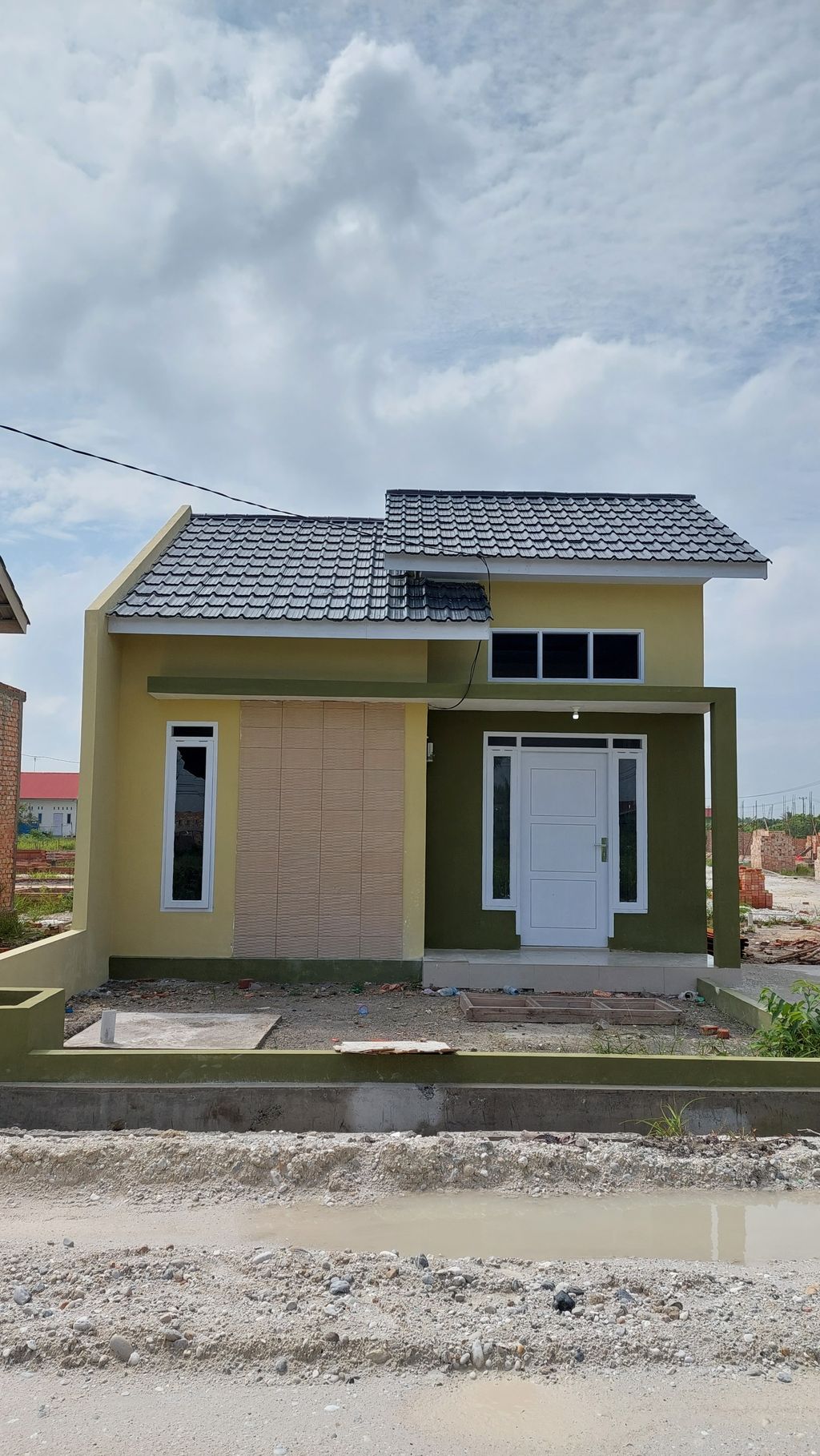 foto tampak rumah tipe 36 perumahan PESONA FATHYYAH KUALU