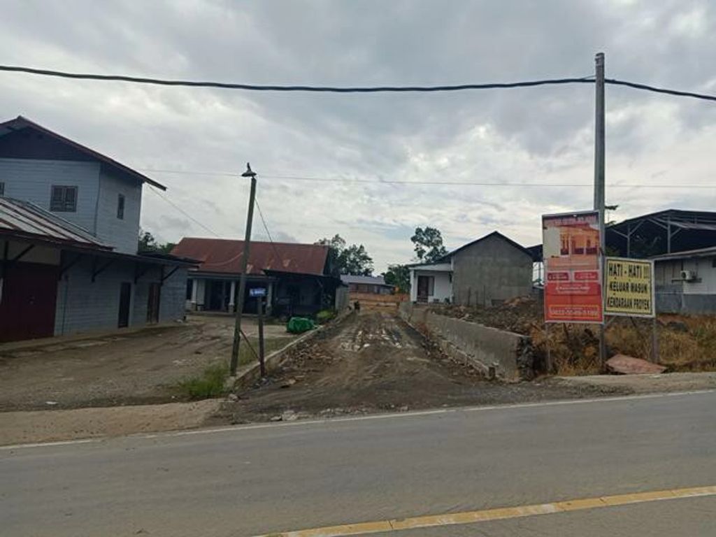 foto gerbang perumahan PESONA GRIYA JELARAI