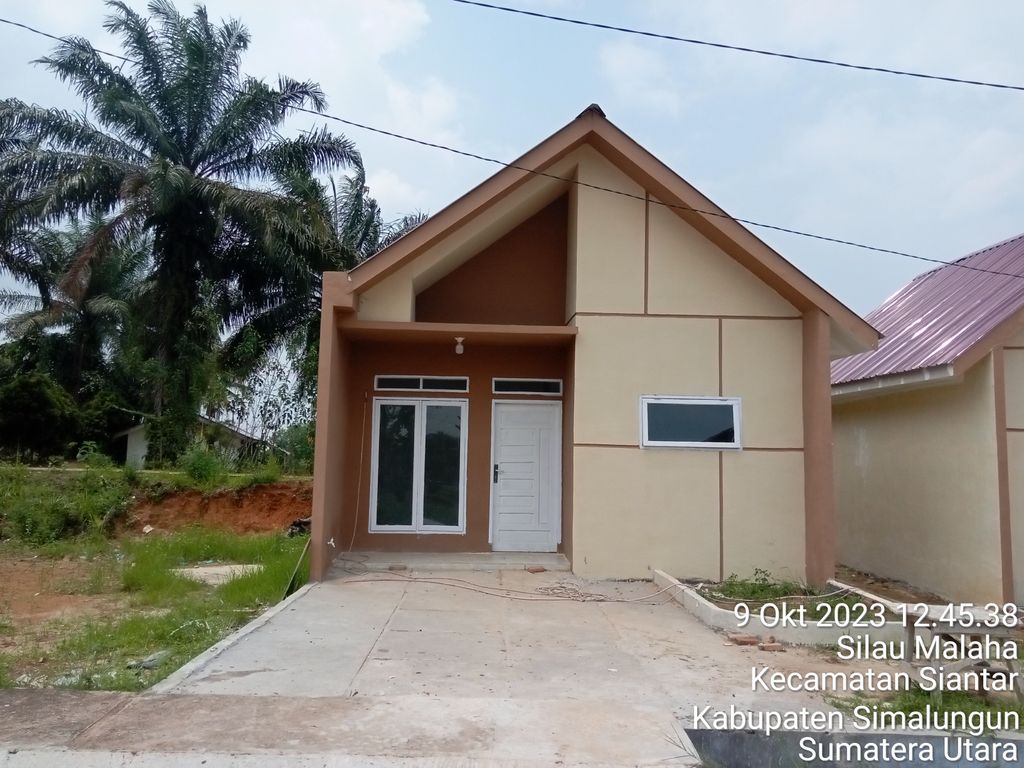 foto contoh rumah perumahan Mutiara Marihat Residence