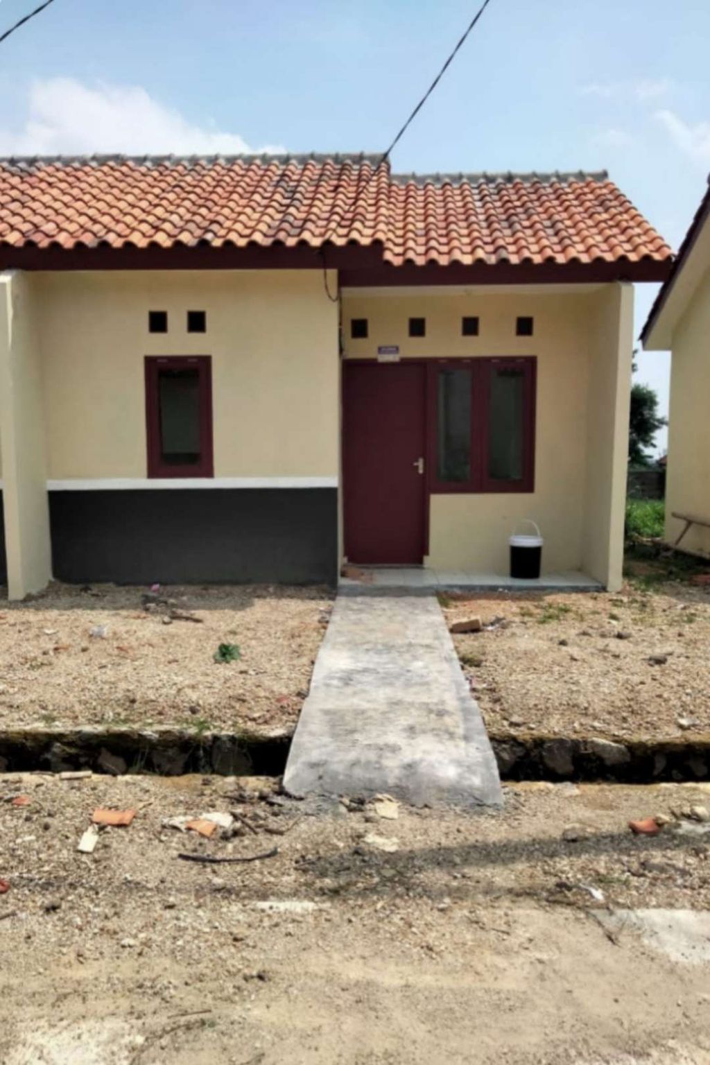 foto tampak rumah tipe 22/60 M2 perumahan Tamansari Village