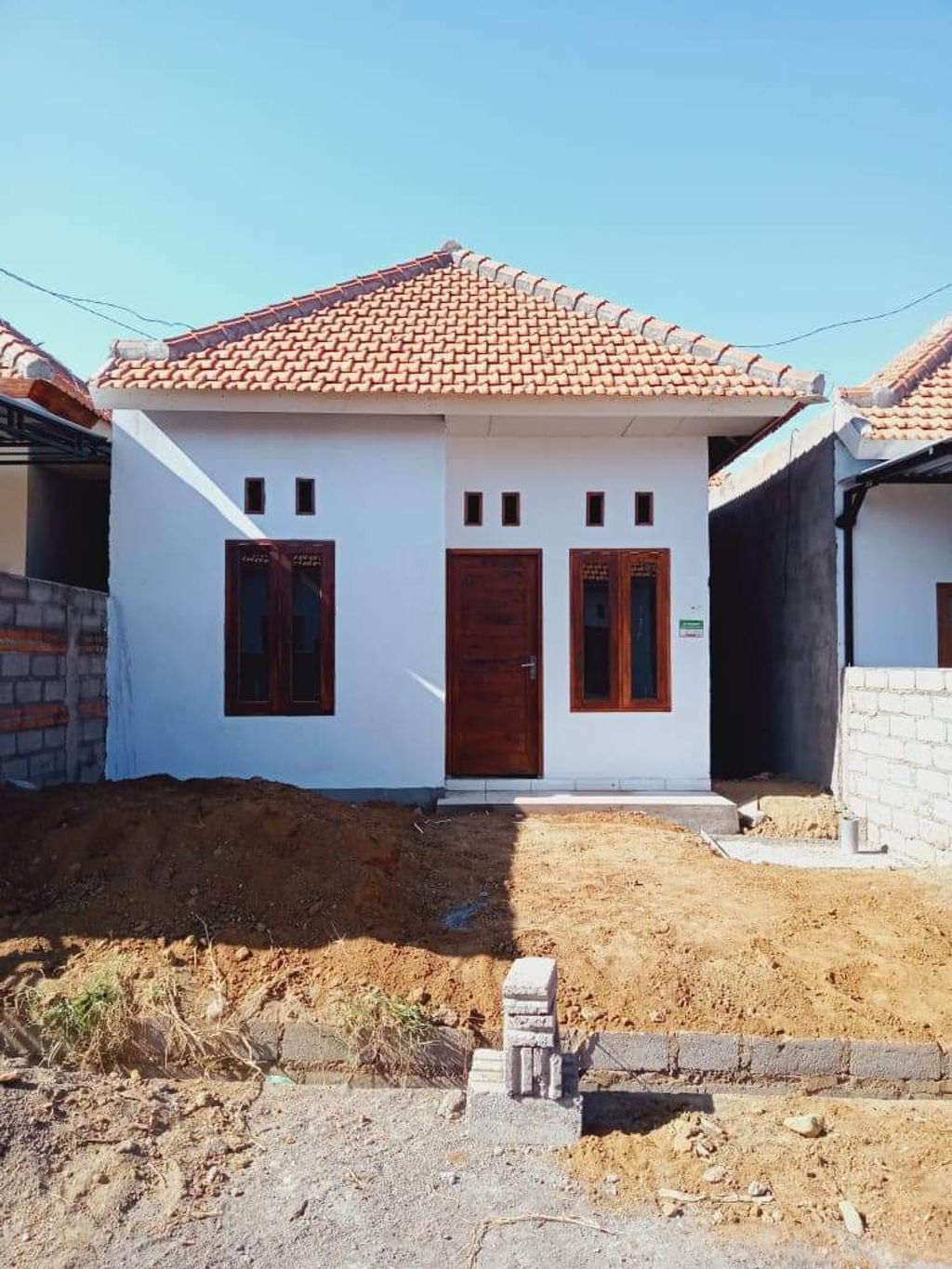 foto tampak rumah tipe 30/65 perumahan PERUM.PULAU OBI HARMONI
