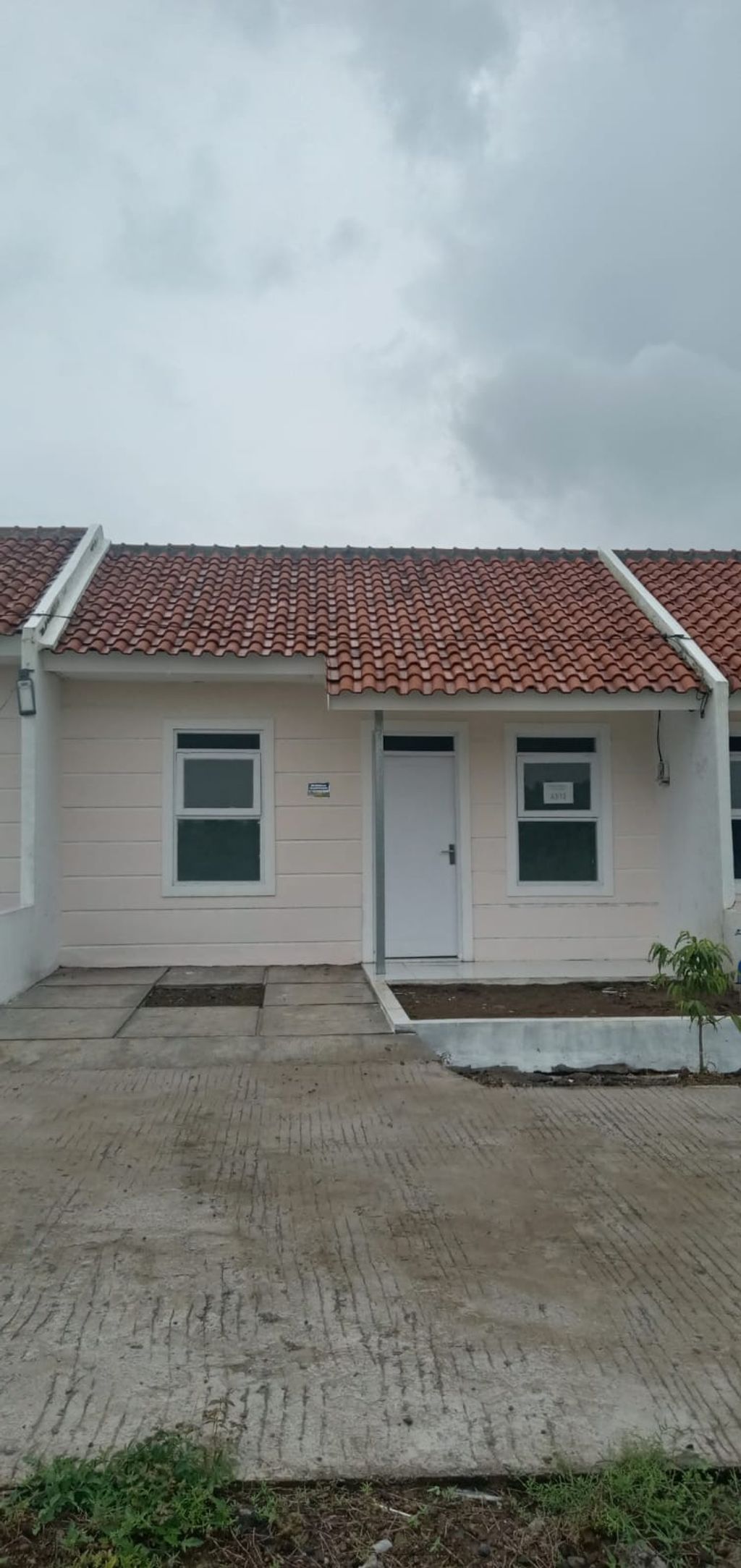 foto tampak rumah tipe 25/60 new perumahan GRAHA PESONA JATITUJUH