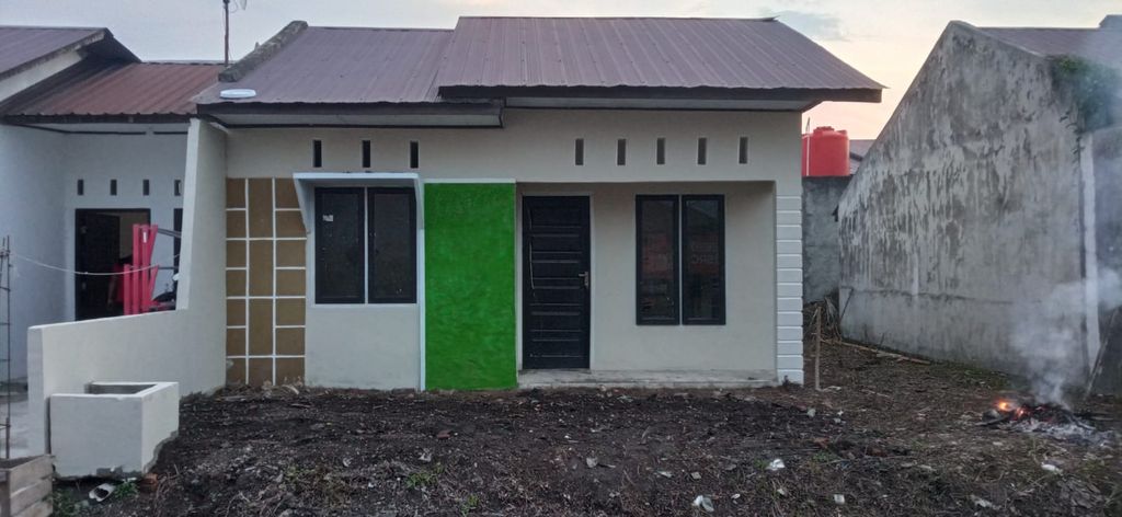 foto tampak rumah tipe 36/117 perumahan BUMI KUBANG RAYA