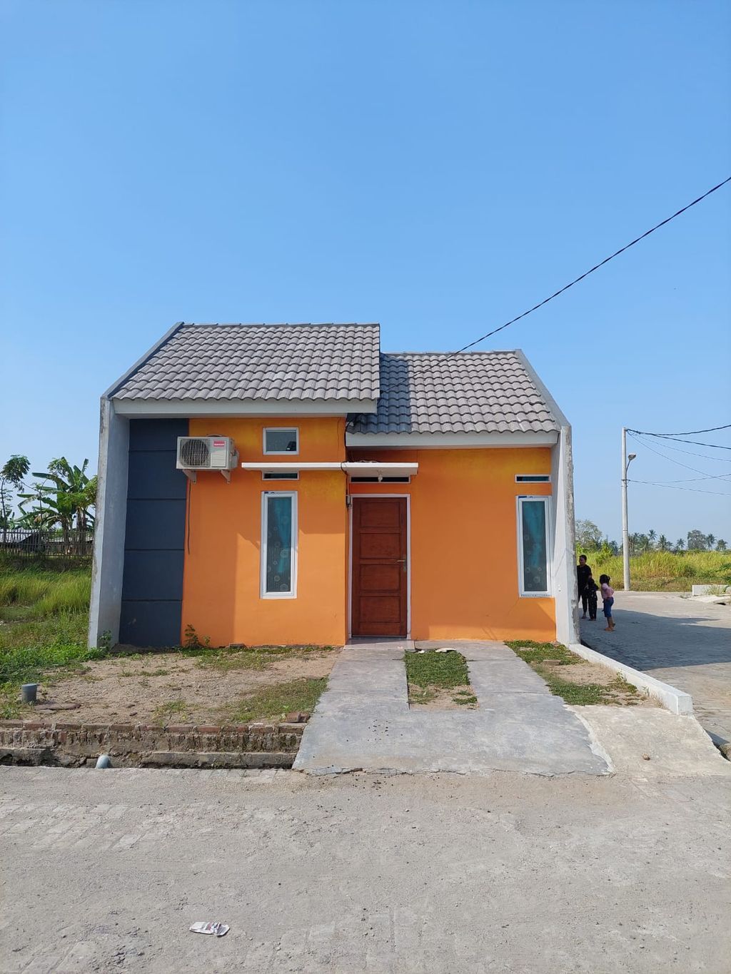 foto tampak rumah tipe 32/63 perumahan CURUG ASRI THP 3