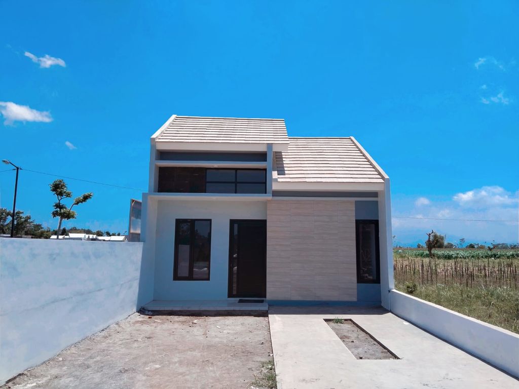 foto tampak rumah tipe 36 perumahan EMERALD RESIDENCE