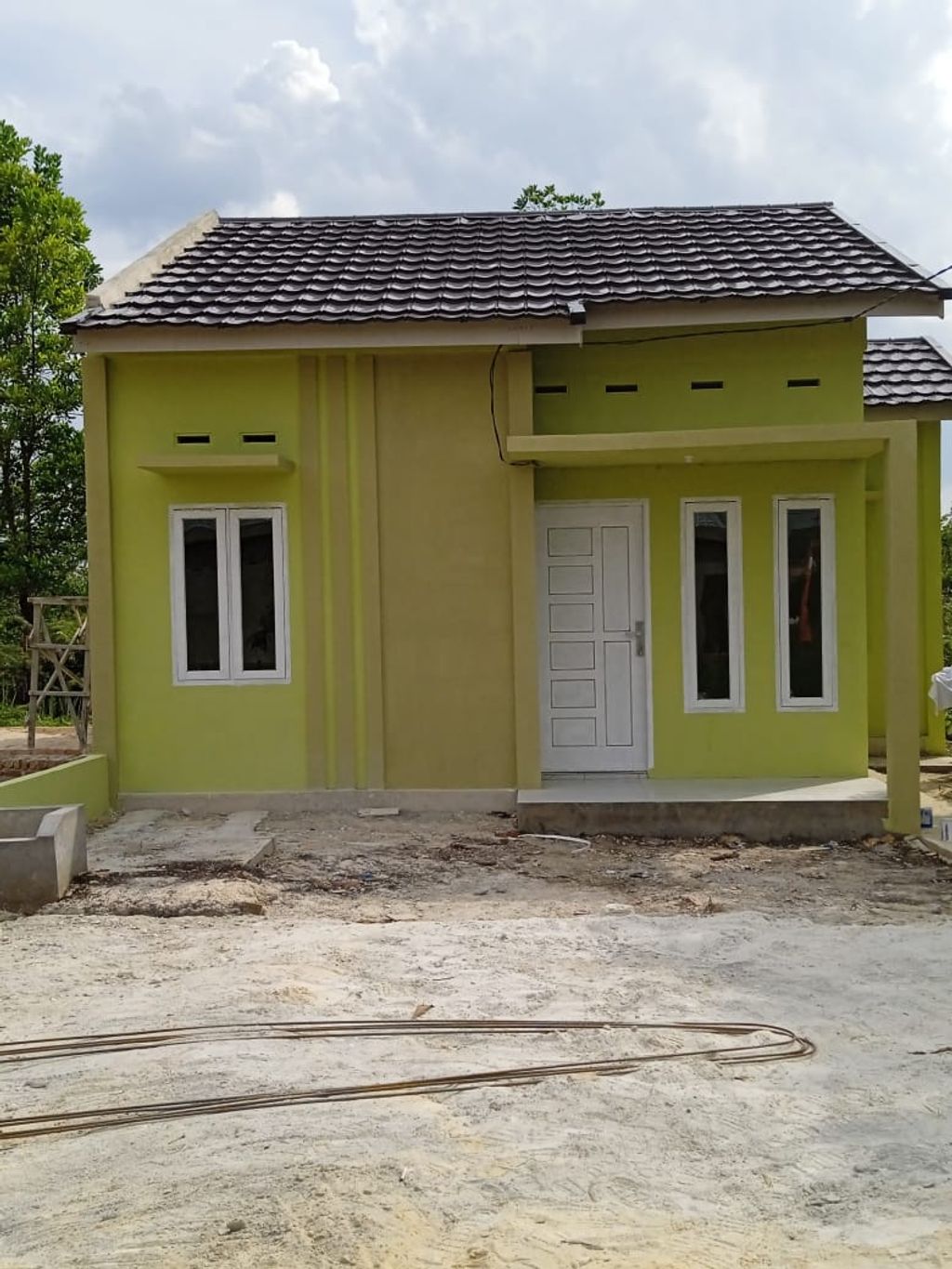 foto tampak rumah tipe 36 RSH perumahan RIMBO HIJAU PERMAI